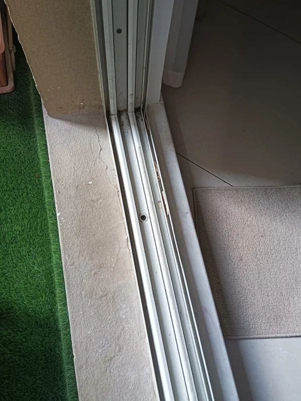 Sliding track cleaned and adjusted in a Dubai home
