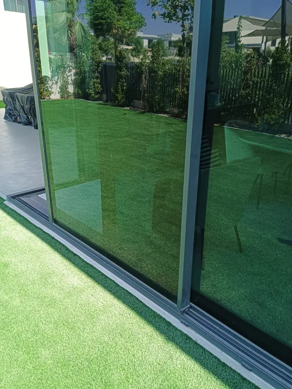 Sliding door with replaced rollers in a Dubai home