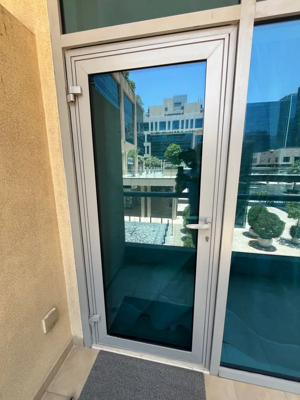 Sliding door with replaced rollers in a Dubai home