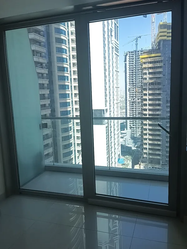 Balcony door repaired and realigned in a Dubai apartment