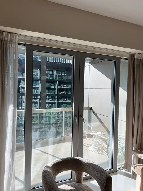 Sliding door with replaced rollers in a Dubai home