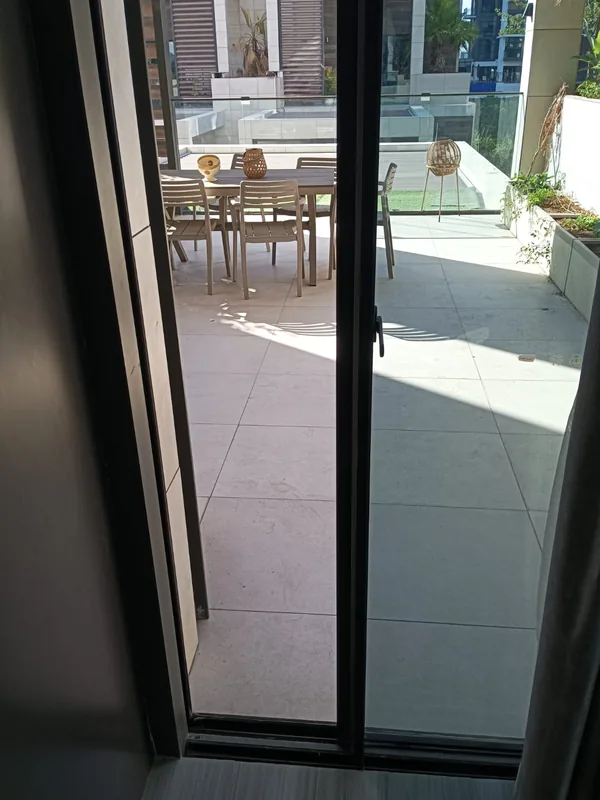 Sliding patio door running smoothly after service in a Dubai villa