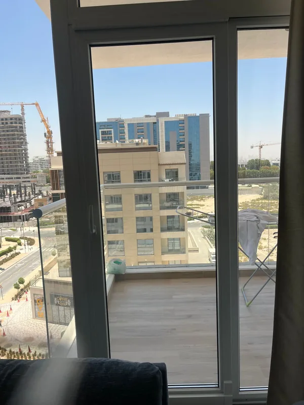 Balcony door repaired and realigned in a Dubai apartment