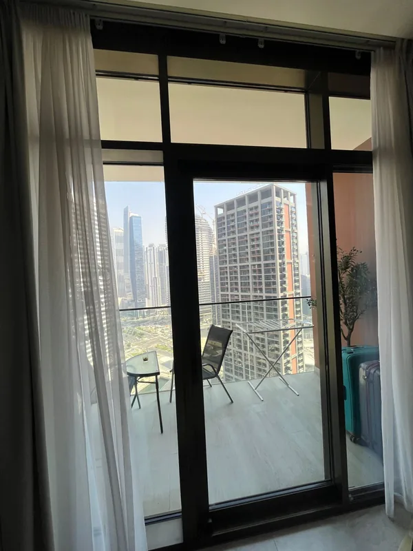 Sliding door with replaced rollers in a Dubai home