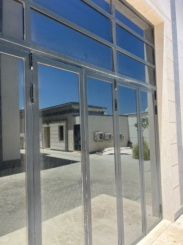 Sliding patio door running smoothly after service in a Dubai villa