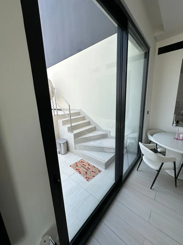 Folding glass doors serviced in a Dubai property