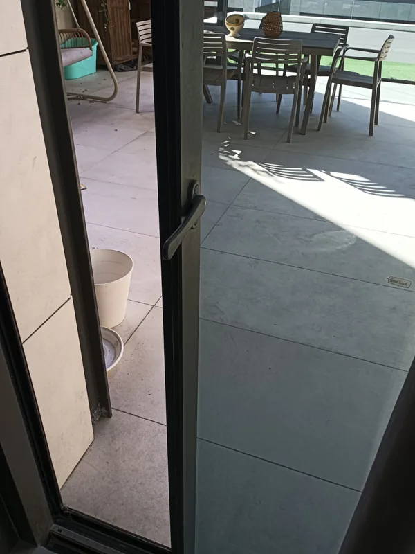 Balcony door repaired and realigned in a Dubai apartment