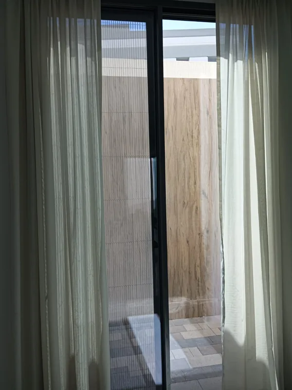Balcony door repaired and realigned in a Dubai apartment