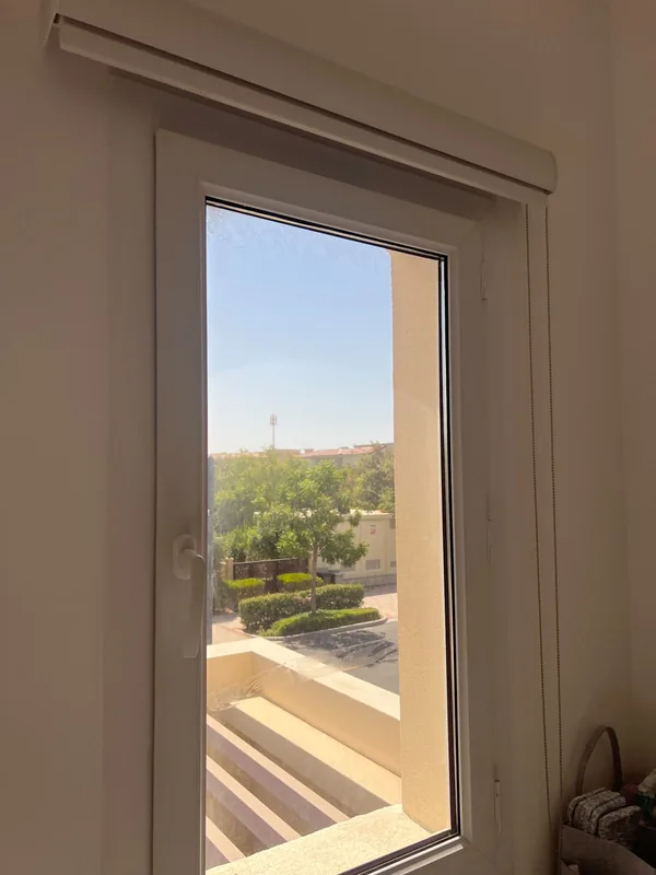 Panoramic sliding doors opening onto a Dubai terrace after repair