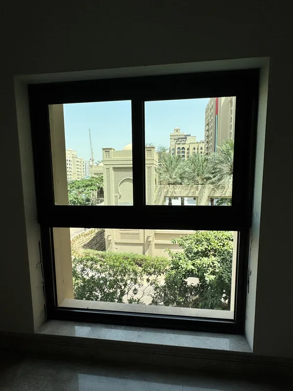 Shopfront glass door maintained by Window Repair UAE in Dubai
