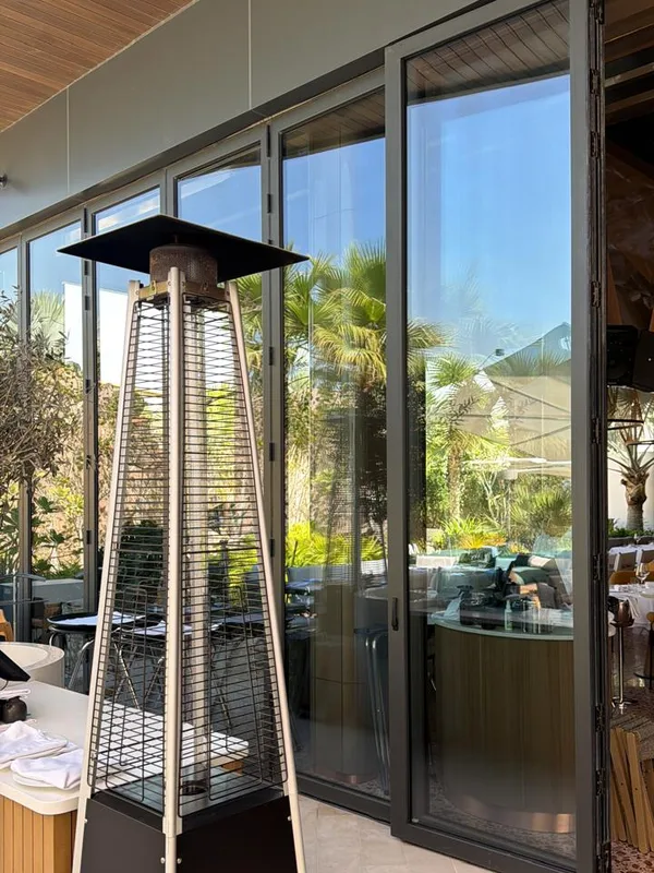 Panoramic sliding doors opening onto a villa terrace in Dubai after repair