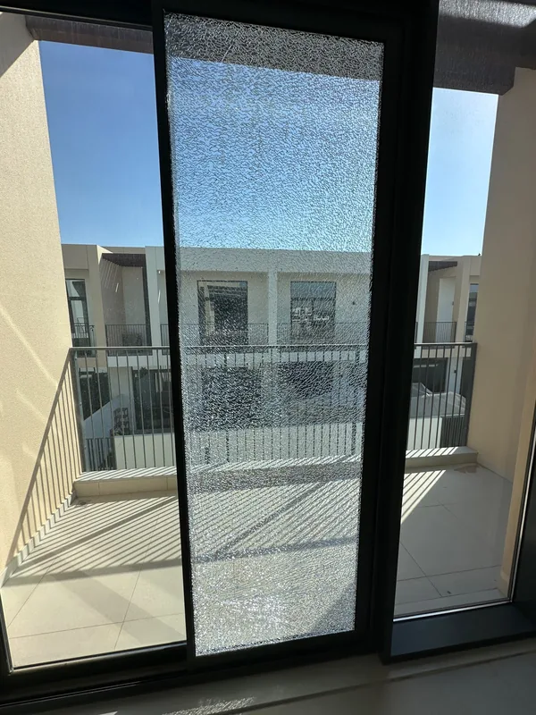 Repaired aluminium window in a Dubai apartment, refitted and sealed