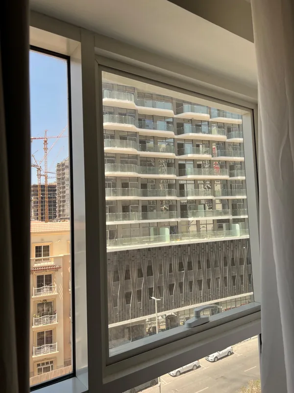 Serviced villa window with an insect screen in Dubai