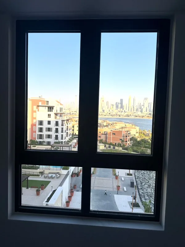 Refitted sliding window in a Dubai residence after repair