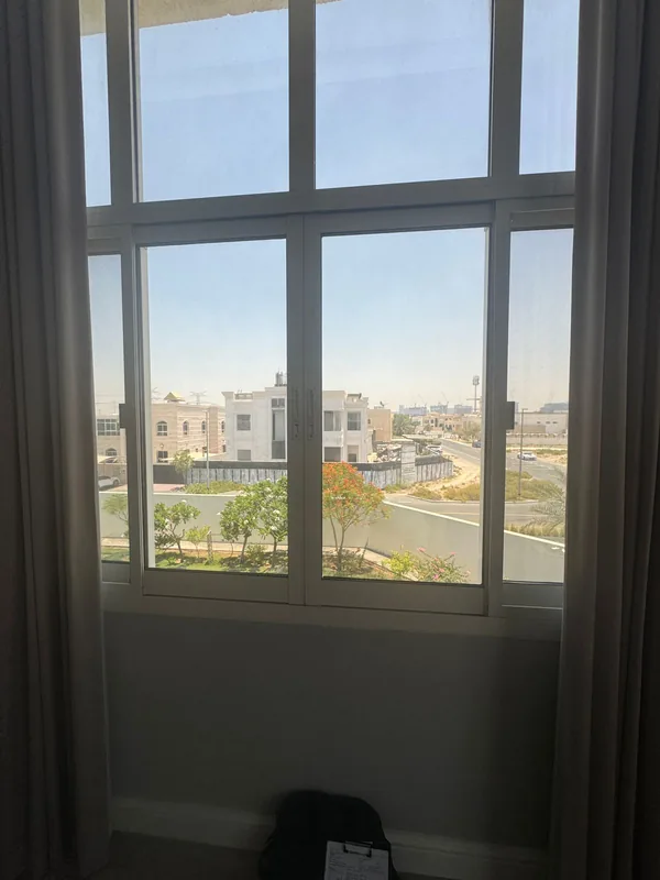 Repaired aluminium window in a Dubai apartment, refitted and sealed