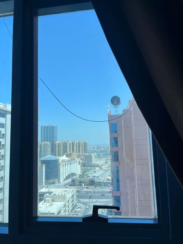 Serviced villa window with an insect screen in Dubai
