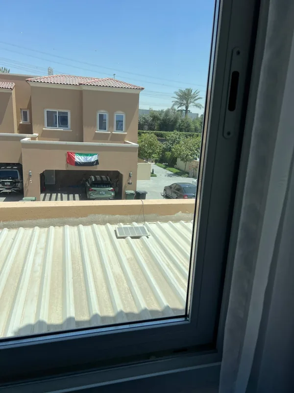Refitted sliding window in a Dubai residence after repair