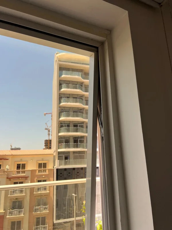 Serviced panoramic window in a Dubai tower apartment