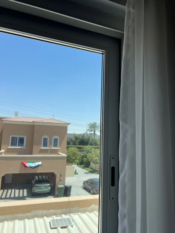 Repaired aluminium window in a Dubai apartment, refitted and sealed