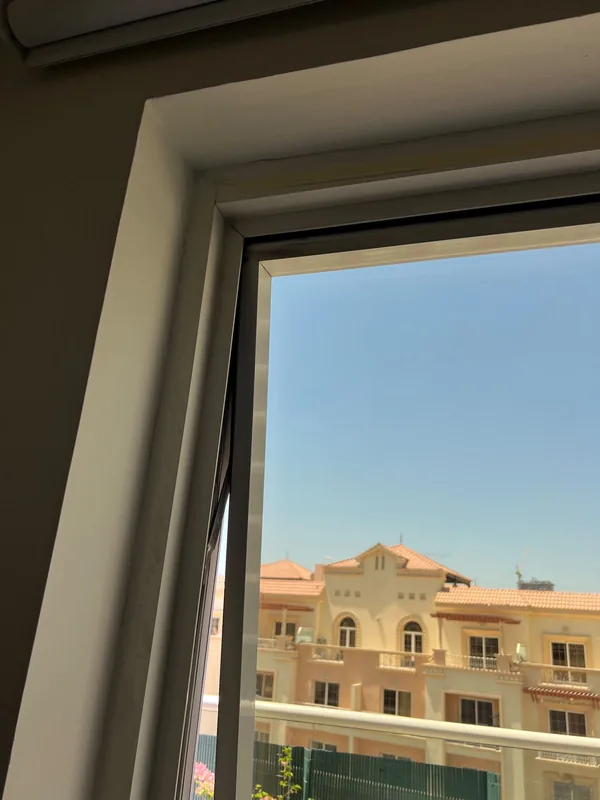 Serviced villa window with an insect screen in Dubai